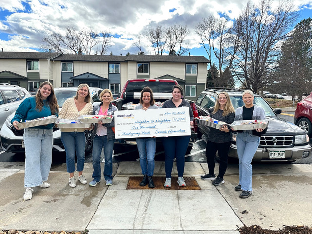 Mantooth Presents Check to Neighbor to Neighbor Organization