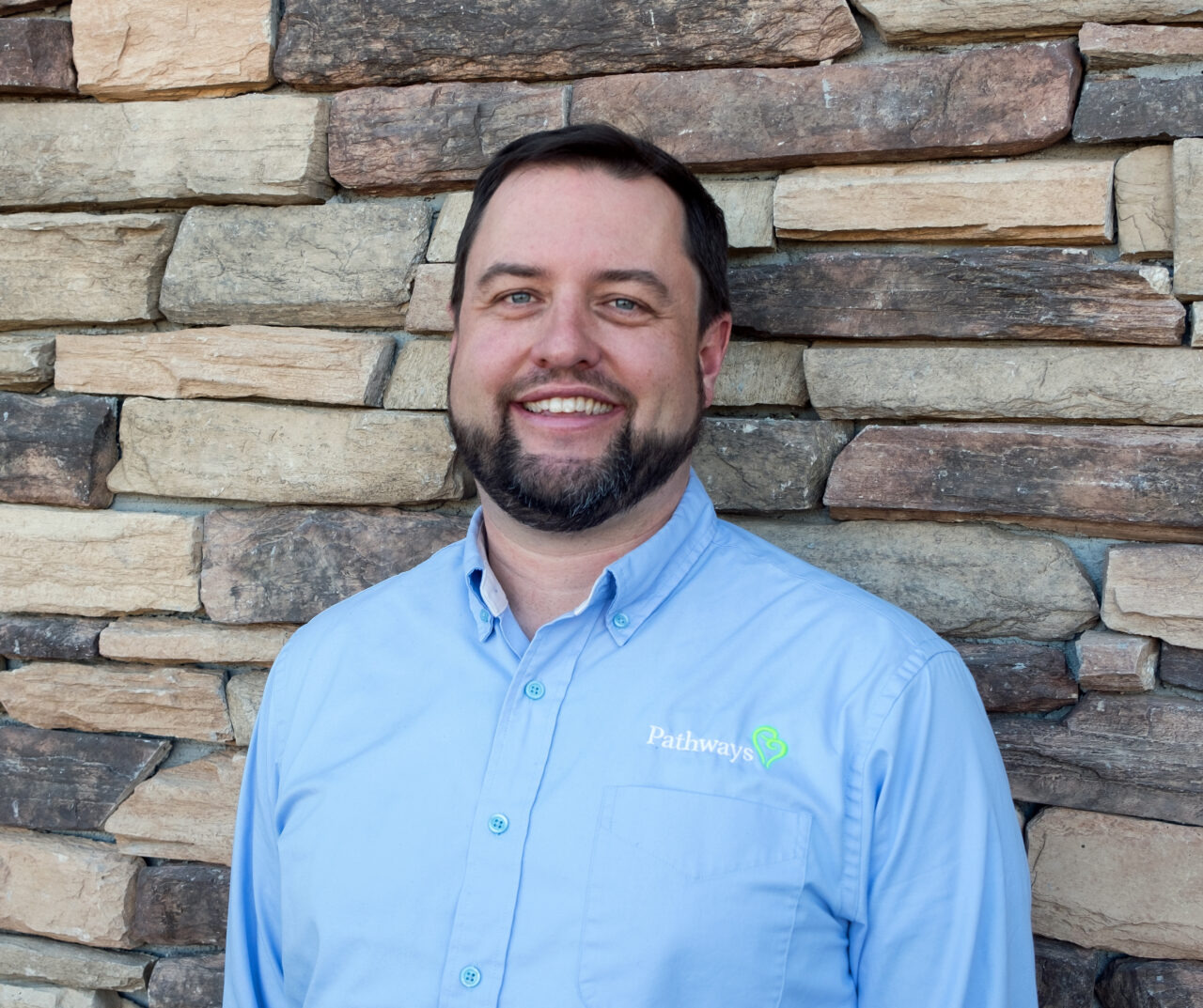 A headshot of Dr. Nathaniel Chappelle, medical director at Pathways Hospice in Fort Collins.