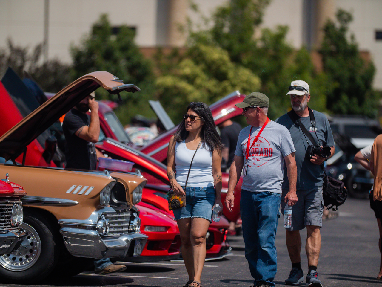 People looking at classic cars at the Aims Car Show in 2023.