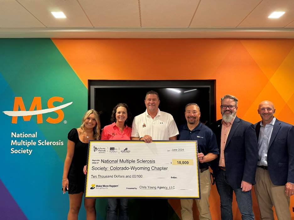 A $10,000 check presented to the National Multiple Sclerosis Society Colorado-Wyoming Chapter.