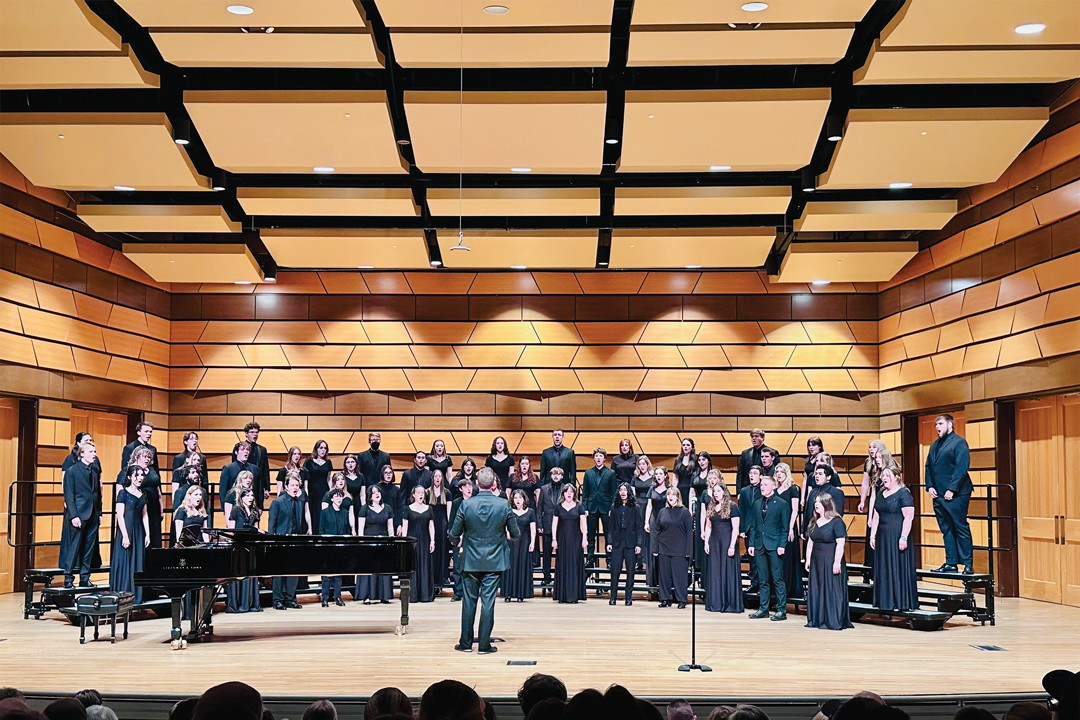 Conductor Nathan Payant leading an All-Choral Holiday Concert. Conductor Nathan Payant leading an All-Choral Holiday Concert.